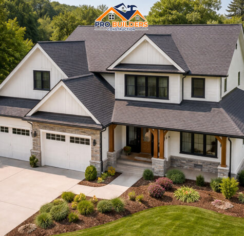 Modern two-story U.S. home with a freshly installed dark shingle roof, clean siding, stone accents, and a landscaped yard on a sunny day.