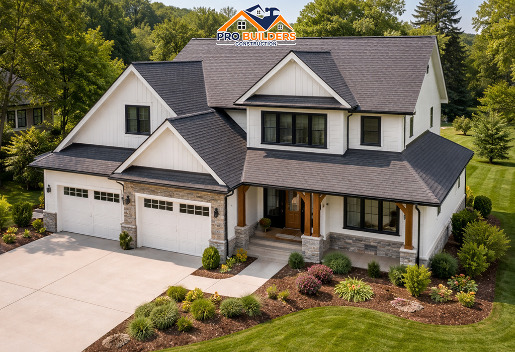 Modern two-story U.S. home with a freshly installed dark shingle roof, clean siding, stone accents, and a landscaped yard on a sunny day.